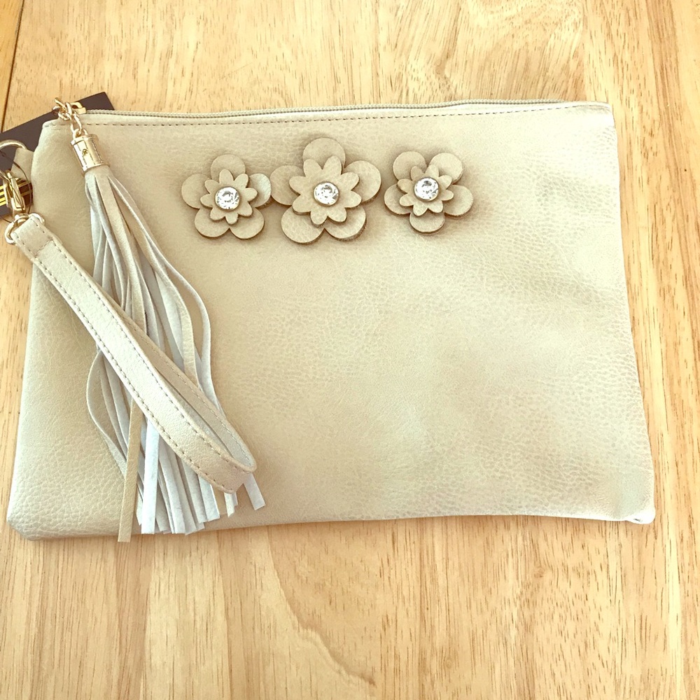- New with tags Beige purse wristlet with flowers
